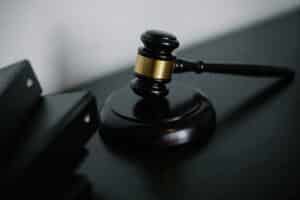 Gavel on a desk representing the Student Trial Advocacy Competition