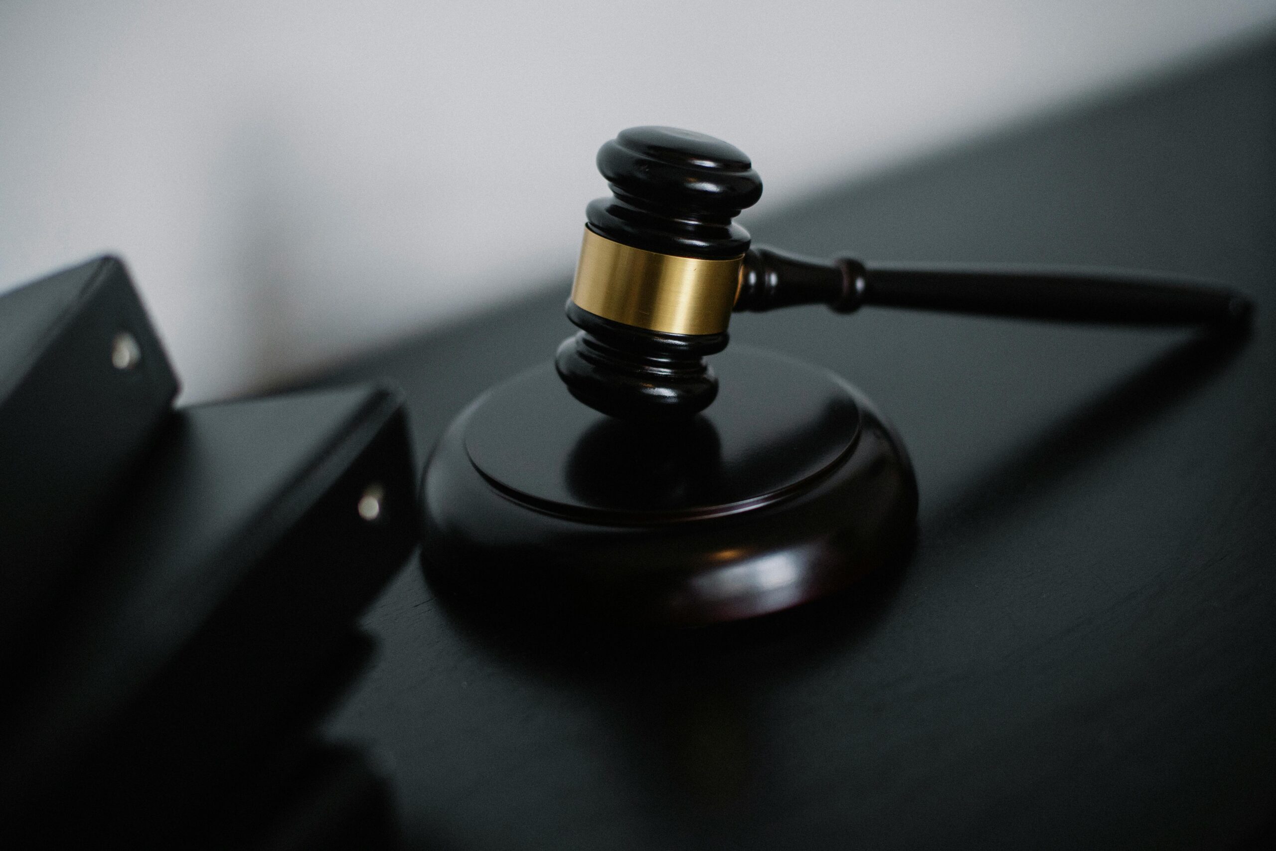 Gavel on a desk representing the Student Trial Advocacy Competition
